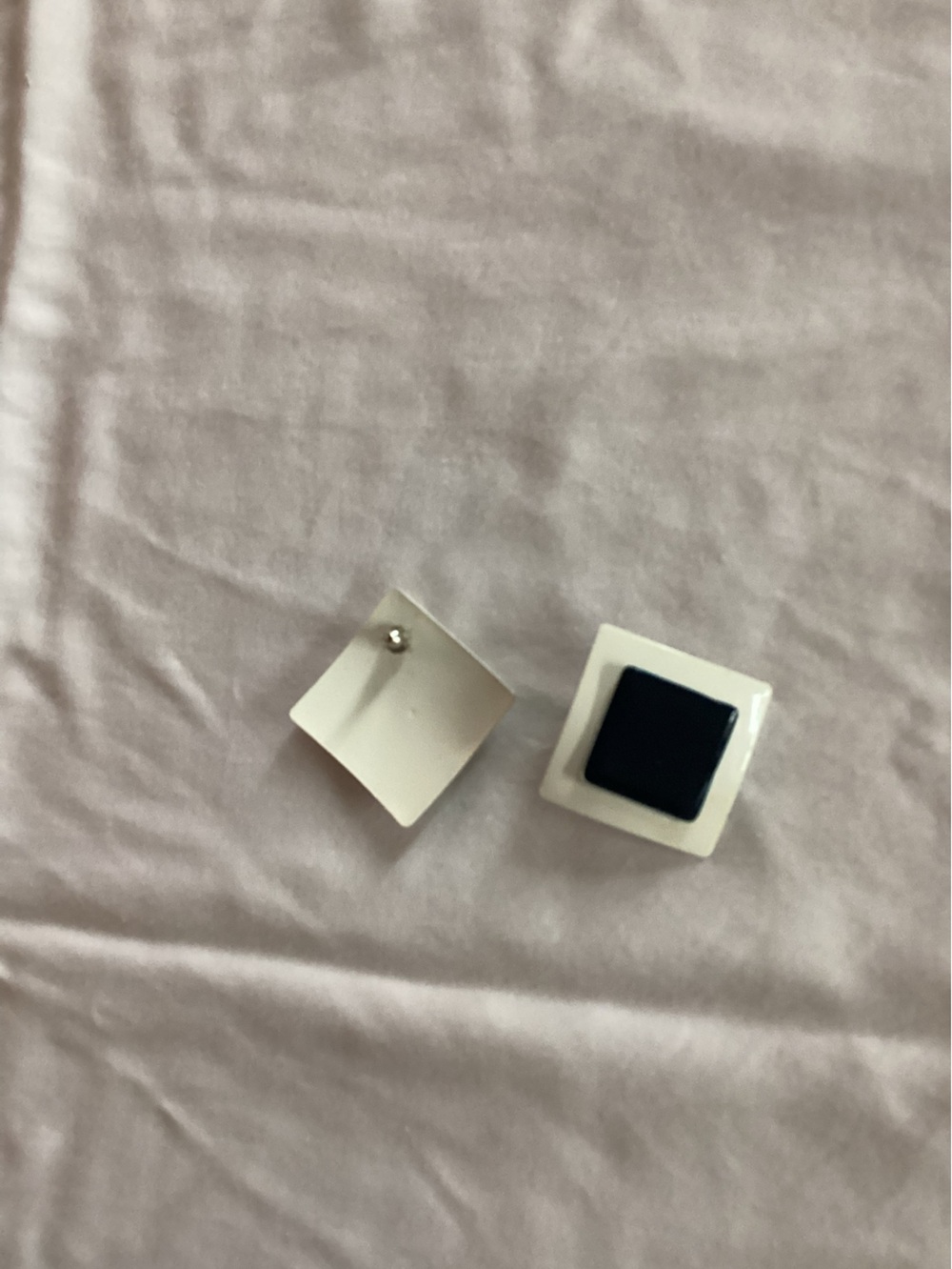 White and black earrings